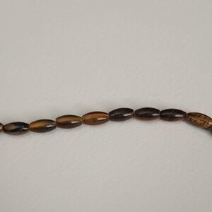 Tigereye Natural Bead Oval 12x6mm Grade C/D K10-6981KS